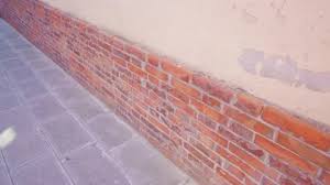 Brick Cladding On Lower Part Of Wall Of