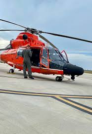 an mh 65 dolphin helicopter sits at the
