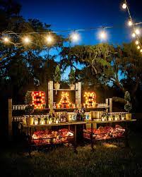 Bar At A Nighttime Garden Wedding