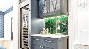 Blue Cabinetry With Emerald Green Glass