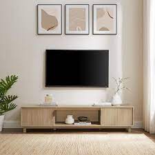 Welwick Designs 70 In Coastal Oak Wood Mid Century Modern Tv Stand With 2 Reeded Doors Fits Tvs Up To 80 In