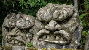 Statues Of An Evil Face In A Japanese