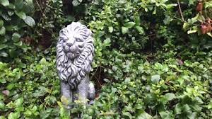 Silver Lion Garden Statue Stands Proud
