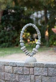 Oval Balanced Garden Sculpture On Stand