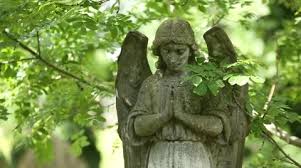 Praying Angel On A Cemetery In England