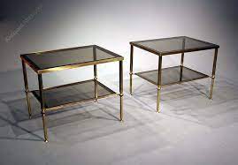 A Pair Of Brass And Glass Side Tables