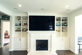 White Fireplace Built Ins With