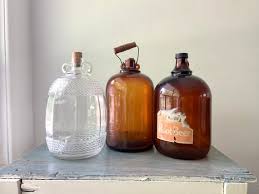 Antique Gallon Jug With Wood Handle