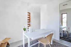 Workroom With White Walls And A Table