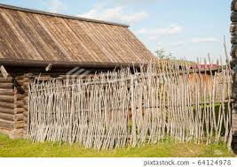 Wicker Rustic Wooden Fence In Village