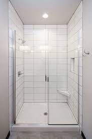 White Tile Shower With Gray Grout And