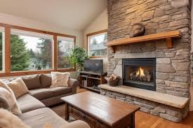 Stone Fireplace With Wooden Mantel In A