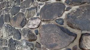 Stone Wall Made Of Large Rocks And