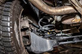 what is torsion beam rear suspension