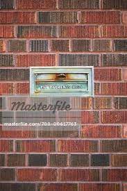 Mail Slot On Brick Wall Stock Photo