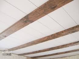 faux barn beam ceiling master bedroom