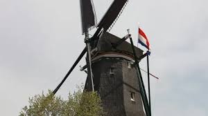 A Windmill At Keukenhof Gardens The