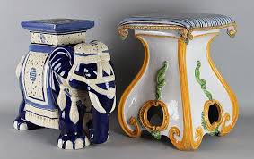 An Asian Ceramic Elephant Together With