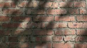 Brick Wall Background With A Shadow Of