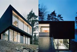 Minimalist Black Hillside House