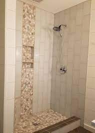 Glass Tile With A Pebble Waterfall