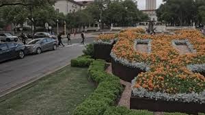 Ut Flower Bed With The Main Building In