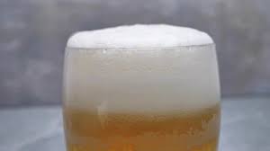 Foamy Beer In Glass Close Up