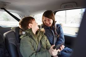 Child Wear A Winter Coat In Car