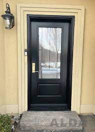 Single Black Entry Door With Decorative