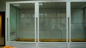 A Cage With Bulletproof Glass For A