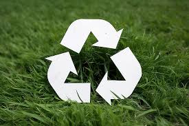 Recycle Icon Cut From White Papers On
