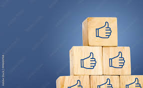 Thumb Up Icon On Wood Cube At Dark Blue