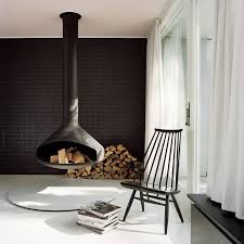 A Hanging Fireplace And Black Accent