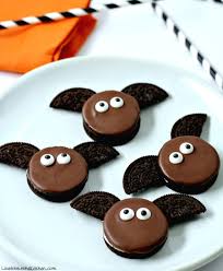 Next, evenly spread melted chocolate across the top half of the oreo, add the candy eyes and you are done! Bat Oreos Love To Be In The Kitchen