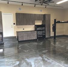 Epoxy coating the floor is not only an easy weekend diy but it is also a great way to help keep your work zone inviting and clean for years to come. Michiana Garage Floor Coatings Epoxy Floors Michiana