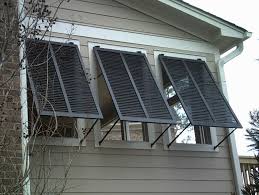 Bahama Storm Shutters Custom Bahama Window Shutters In Florida Bahama Shutters Shutters Exterior Hurricane Windows