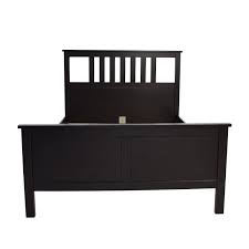 Were it not for the vivid white wall for contrast coupled with the bold crimson linens on the bed, the ebony bed frame, door, and night stand details might otherwise be. 53 Off Ikea Ikea Dark Brown Wood Queen Bed Frame Beds