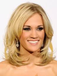 Lovely bob hairstyle for medium wavy light champagne blonde colored hair. Carrie Underwood Hairstyles Star Hairstyles