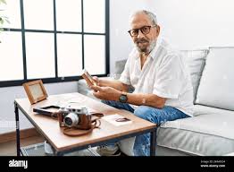 Photographer sitting at table hi-res stock photography and images