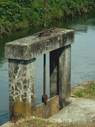 Gates & accessories home repair & maintenance overhead doors. What Is A Sluice Gate With Pictures