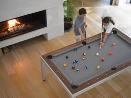 This cool table has a very unique shape and multifunctional. Pool Table Dining Table Combination Archives Digsdigs