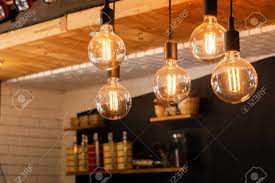 Antique light bulbs antique lighting candelabra glow base antiques honey home decor antique lamps. Decorative Antique Led Tungsten Light Bulbs Hanging On Ceiling Stock Photo Picture And Royalty Free Image Image 101135025