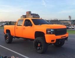 Neon Orange Chevy Jacked Up Trucks Lifted Chevy Trucks Trucks