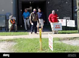 Jacksonville, FL November 3rd: Multiple voters exit a lineless Precinct  1411 in Duval County Florida for the 2020 Presidential Election.  Jacksonville, FL November 3rd, 2020 Credit: Edward Kerns II/MediaPunch  Stock Photo