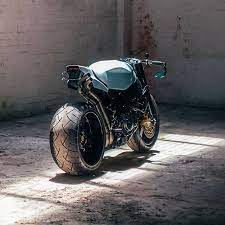 A Car Wheel And 240 Tire Was Matched With A Vfr Swingarm On Wenley Andrews Honda Cbr954rr Beastly Photo Cafe Racer Bikes Cafe Racer Motorcycle Motorcycle