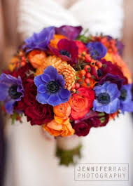 They are basically the flowers which need to be arranged in floral arrangements according to your preferences and choices, or according to the theme of the wedding. Purple Anemone And Orange Flower Wedding Bouquet