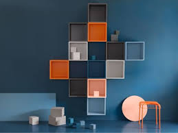 Un Mur Bleu Avec Des Cubes En Gris Orange Et Bleu Meubles Ikea Deco Meuble Tv Decoration Maison