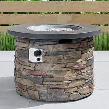 They typically are three foot round and cost under $200. Sego Lily Sage 35 In X 24 In Round Stone Propane Fire Pit Table With Storage Cover Sl Rndft 4 Stn The Home Depot Propane Fire Pit Table Outdoor Fire Table Propane Fire Pit