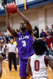 Josh Reid's last-minute layup gives Village dramatic win over Trinity