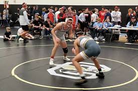Burns senior Baylen Smith Fulfills Dream to Wrestle in College